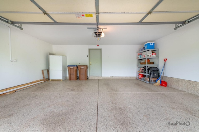 155 Willow Blvd, Willow Springs, IL 60480 - garage with freestanding refrigerator and a garage door opener