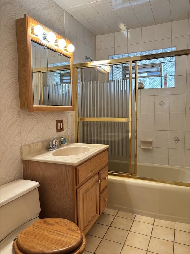 2825 N Indian Boundary Rd, River Grove, IL 60171 - full bathroom featuring toilet, wallpapered walls, tile patterned floors, vanity, and enclosed tub / shower combo