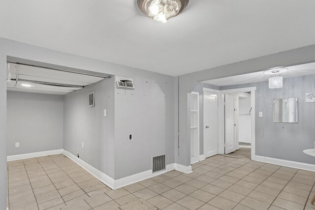 3731 Maple Ave, Berwyn, IL 60402 - empty room with baseboards and light tile patterned floors