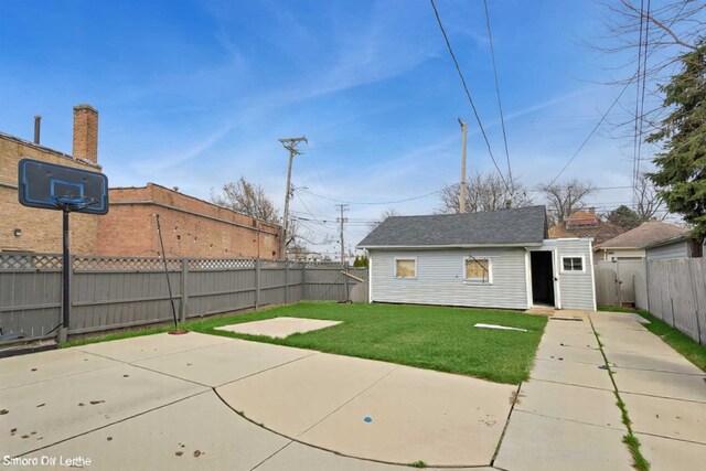 3731 Maple Ave, Berwyn, IL 60402 - back of house with a patio area and an outbuilding