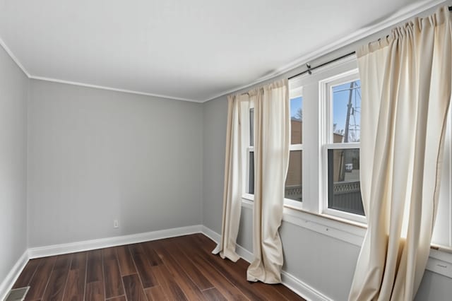 3731 Maple Ave, Berwyn, IL 60402 - empty room with baseboards and dark wood-style flooring