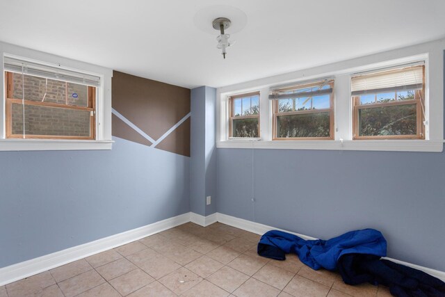 3731 Maple Ave, Berwyn, IL 60402 - unfurnished room with baseboards and tile patterned flooring