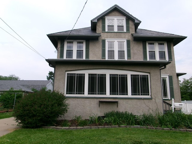 1023 Rock St, Peru, IL 61354 - view of home's exterior with stucco siding