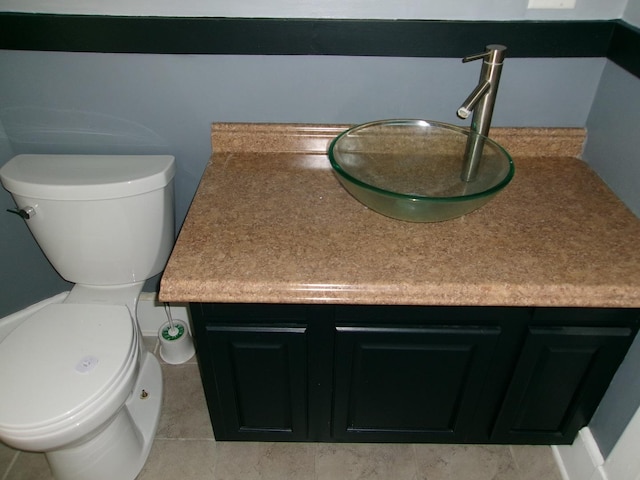 1023 Rock St, Peru, IL 61354 - bathroom featuring toilet, vanity, and tile patterned floors
