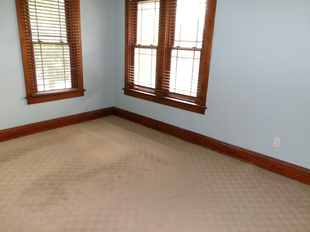1023 Rock St, Peru, IL 61354 - empty room with carpet flooring and baseboards