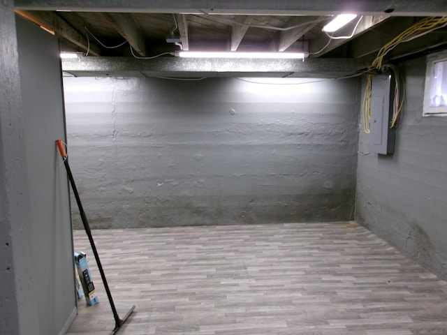 1023 Rock St, Peru, IL 61354 - unfinished basement with wood finished floors and electric panel