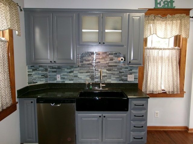 1023 Rock St, Peru, IL 61354 - kitchen with stainless steel dishwasher, a sink, dark wood-style flooring, and gray cabinets