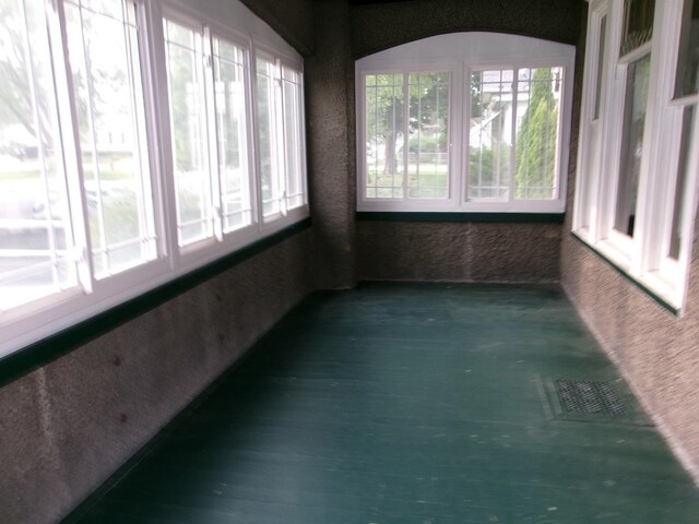1023 Rock St, Peru, IL 61354 - unfurnished sunroom with a textured wall