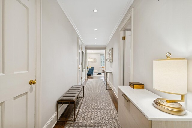 210 E Pearson St Unit 11A, Chicago, IL 60611 - corridor with dark wood-style floors, crown molding, recessed lighting, and baseboards