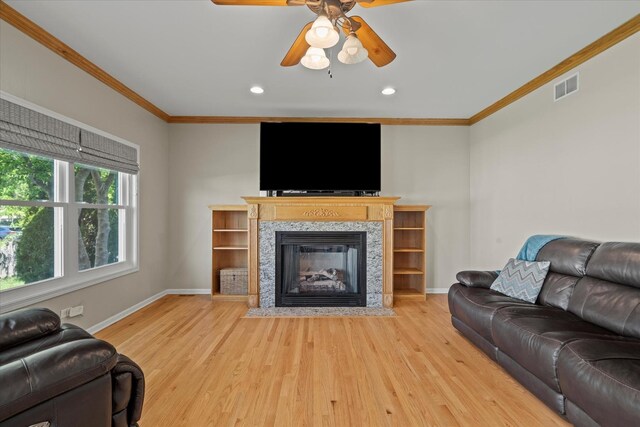 1809 Pembrook Ct, Plainfield, IL 60586 - living room with crown molding, wood finished floors, baseboards, a ceiling fan, and recessed lighting