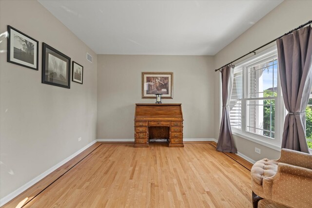 1809 Pembrook Ct, Plainfield, IL 60586 - living room with light wood finished floors and baseboards