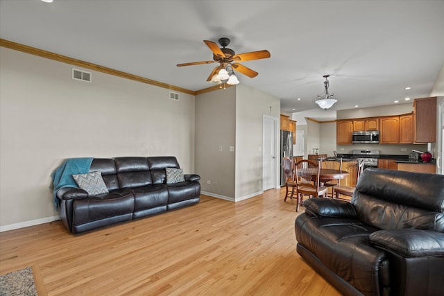 1809 Pembrook Ct, Plainfield, IL 60586 - living room featuring baseboards, a ceiling fan, light wood finished floors, recessed lighting, and ornamental molding