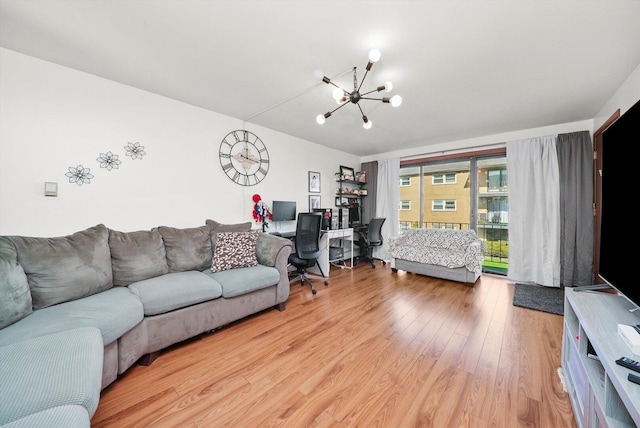 6568 W Roscoe St Unit 2N, Chicago, IL 60634 - living area with a chandelier, an office area, and light wood-style flooring