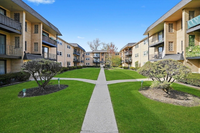 6568 W Roscoe St Unit 2N, Chicago, IL 60634 - view of community featuring a residential view and a lawn