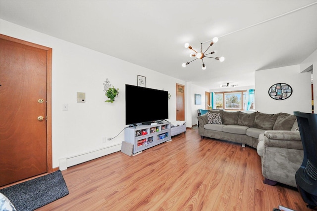 6568 W Roscoe St Unit 2N, Chicago, IL 60634 - living room featuring light wood-style flooring, a chandelier, and baseboard heating