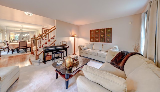 713 Warwick Ln, Lake Zurich, IL 60047 - living room featuring stairs and a chandelier