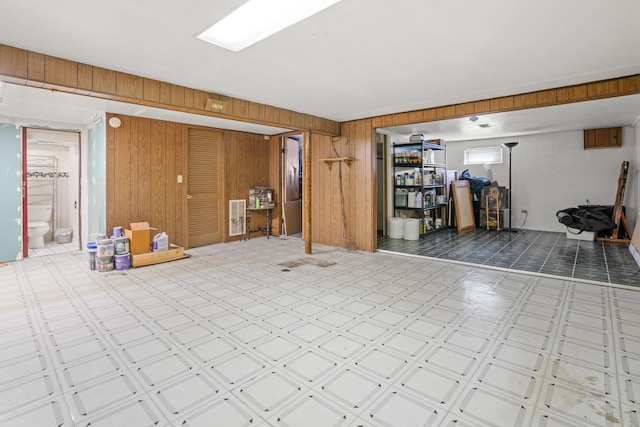 8014 W Summerdale Ave, Chicago, IL 60656 - finished basement with wooden walls and tile patterned floors