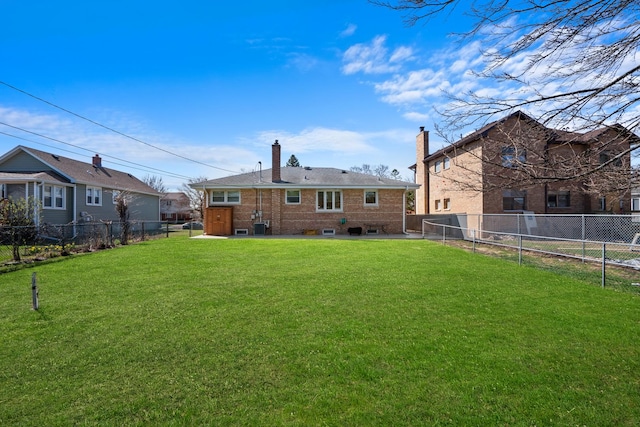 8014 W Summerdale Ave, Chicago, IL 60656 - rear view of property with central AC, a chimney, and brick siding