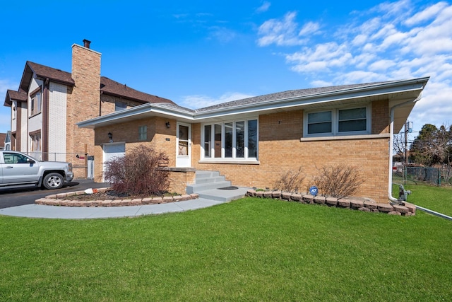 8014 W Summerdale Ave, Chicago, IL 60656 - view of front of property featuring brick siding and a garage