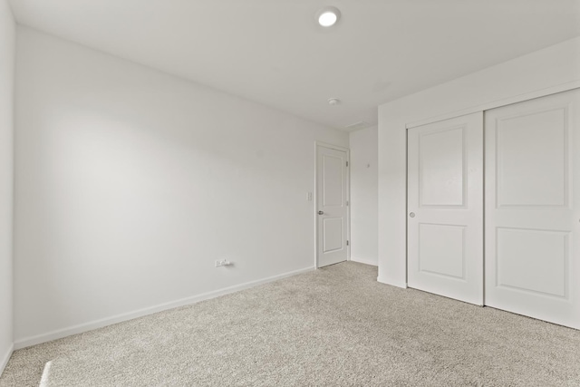 6712 Eich Dr, Joliet, IL 60431 - unfurnished bedroom featuring carpet floors, baseboards, and a closet