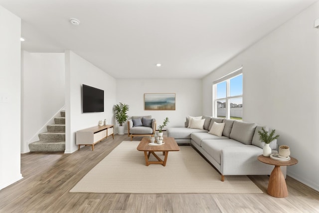 6712 Eich Dr, Joliet, IL 60431 - living room featuring stairway, recessed lighting, and light wood-style floors