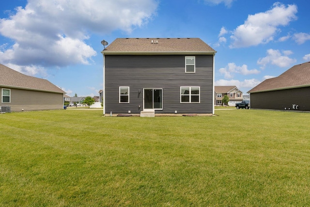 6712 Eich Dr, Joliet, IL 60431 - rear view of property with a lawn