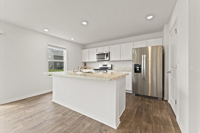 6712 Eich Dr, Joliet, IL 60431 - kitchen with stainless steel appliances, light countertops, dark wood-style flooring, white cabinets, and recessed lighting