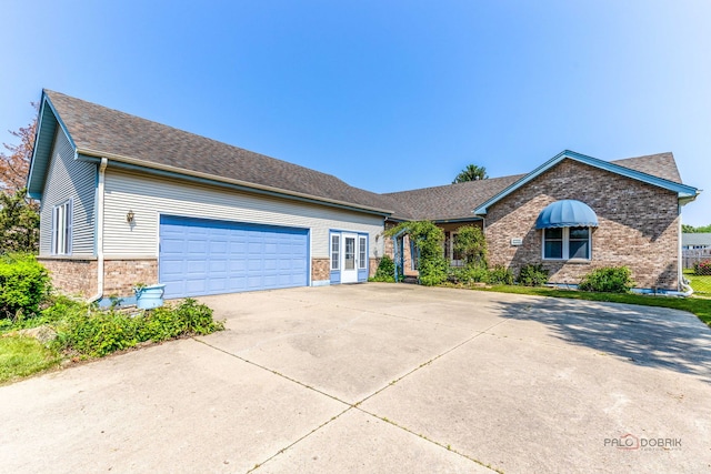 3206 Turnberry Dr, Mchenry, IL 60050 - ranch-style house featuring brick siding, concrete driveway, an attached garage, and roof with shingles