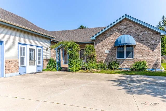 3206 Turnberry Dr, Mchenry, IL 60050 - view of front facade featuring brick siding