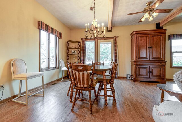 3206 Turnberry Dr, Mchenry, IL 60050 - dining room with healthy amount of natural light, wood finished floors, and beamed ceiling