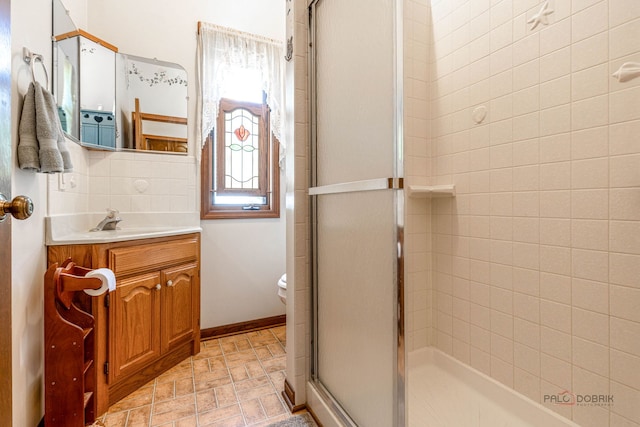 3206 Turnberry Dr, Mchenry, IL 60050 - bathroom featuring vanity, a stall shower, and toilet