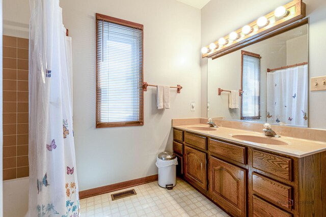3206 Turnberry Dr, Mchenry, IL 60050 - full bathroom with tile patterned floors and double vanity