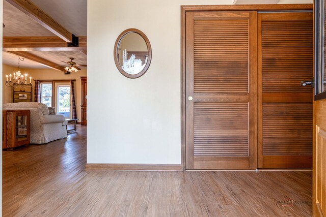 3206 Turnberry Dr, Mchenry, IL 60050 - hall with wood finished floors, baseboards, a chandelier, and beamed ceiling