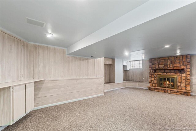 9544 S Avers Ave, Evergreen Park, IL 60805 - basement featuring carpet, wood walls, and a fireplace