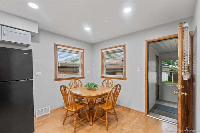 9544 S Avers Ave, Evergreen Park, IL 60805 - dining area featuring plenty of natural light, baseboards, light wood-style floors, and recessed lighting