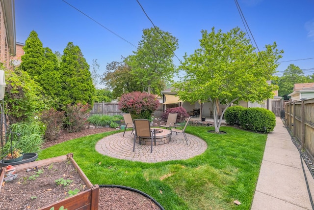 5111 S Luna Ave, Chicago, IL 60638 - view of yard with a garden, a patio area, and a fire pit