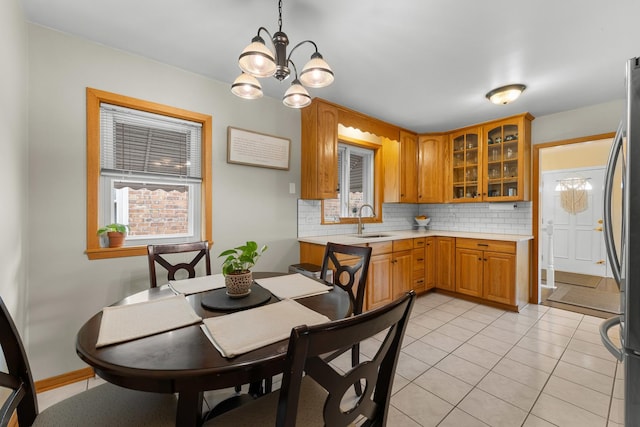 5111 S Luna Ave, Chicago, IL 60638 - dining area with a chandelier and light tile patterned flooring