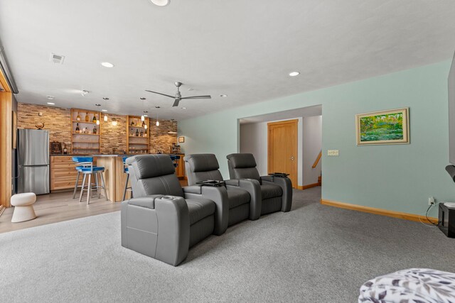 515 Stone Ridge Ln, Cherry Valley, IL 61016 - cinema with wet bar, recessed lighting, ceiling fan, and light colored carpet