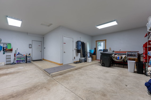 515 Stone Ridge Ln, Cherry Valley, IL 61016 - garage featuring a central vacuum unit
