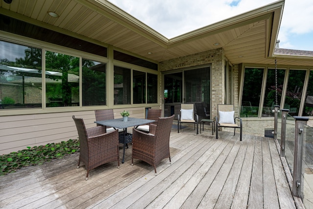 515 Stone Ridge Ln, Cherry Valley, IL 61016 - wooden terrace with outdoor dining space