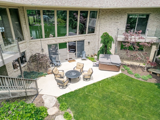 515 Stone Ridge Ln, Cherry Valley, IL 61016 - view of patio / terrace with a hot tub