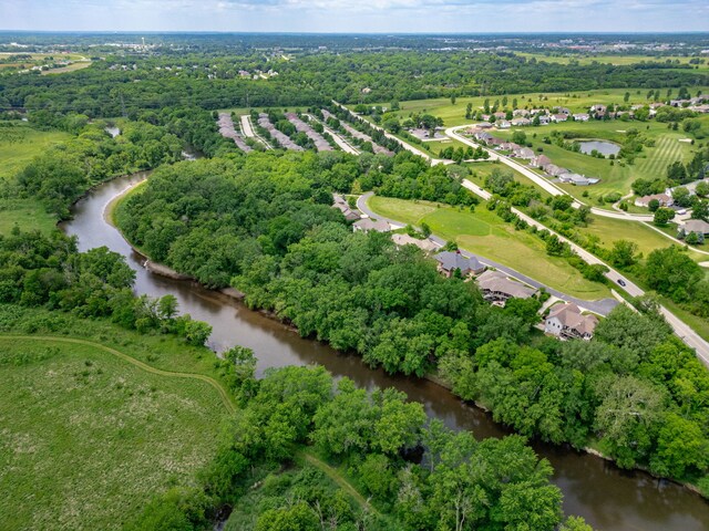 515 Stone Ridge Ln, Cherry Valley, IL 61016 - aerial view of property's location featuring a large body of water and a tree filled landscape