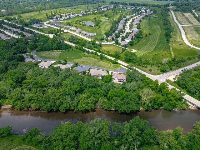 515 Stone Ridge Ln, Cherry Valley, IL 61016 - aerial view of property and surrounding area featuring a large body of water and a tree filled landscape