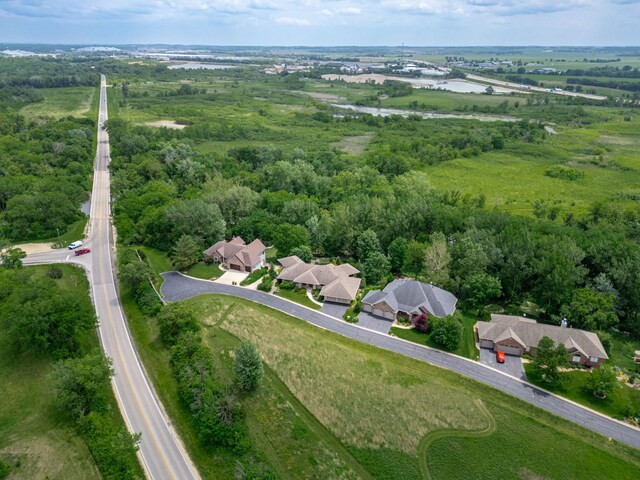 515 Stone Ridge Ln, Cherry Valley, IL 61016 - aerial view of property and surrounding area with nearby suburban area