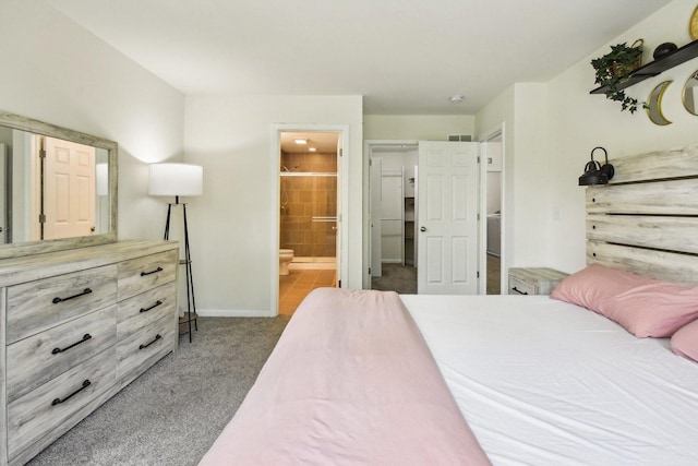 29W690 Cambridge Ct, Warrenville, IL 60555 - carpeted bedroom with connected bathroom and baseboards