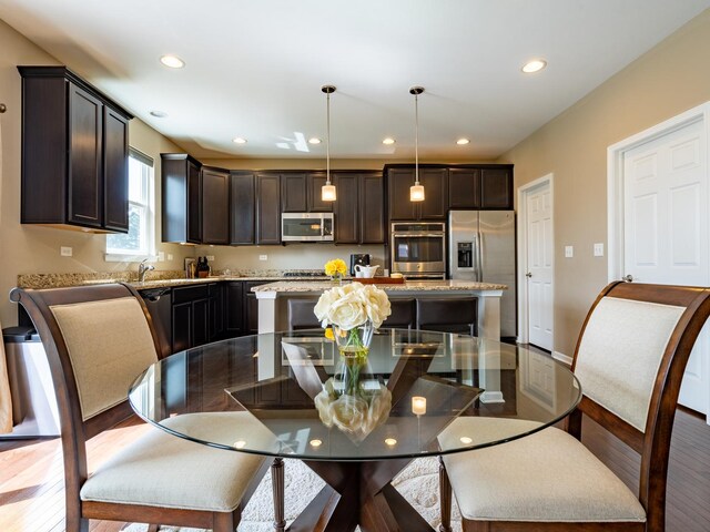 3740 Ryder Ct, Naperville, IL 60564 - dining room with recessed lighting and wood finished floors