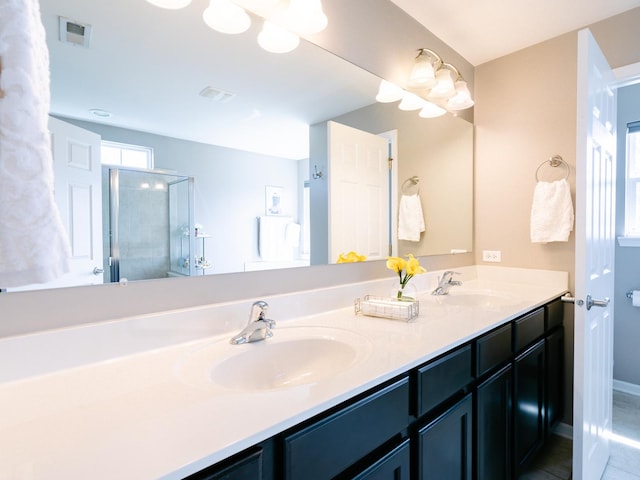 3740 Ryder Ct, Naperville, IL 60564 - full bath featuring double vanity, a shower stall, tile patterned flooring, and baseboards