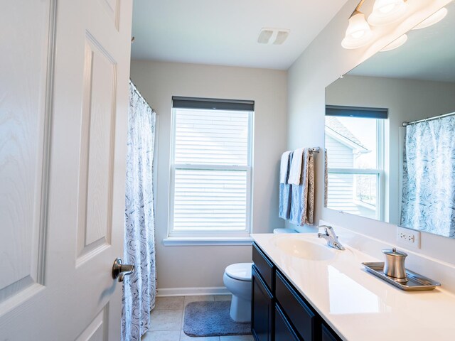 3740 Ryder Ct, Naperville, IL 60564 - full bath with vanity, toilet, tile patterned flooring, and baseboards