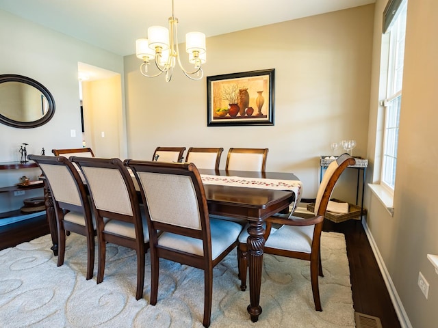 3740 Ryder Ct, Naperville, IL 60564 - dining room with wood finished floors, a chandelier, and baseboards