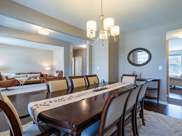 3740 Ryder Ct, Naperville, IL 60564 - dining room featuring dark wood-style flooring, a chandelier, and baseboards